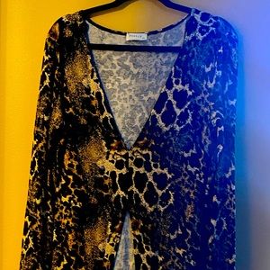 Poetry brand leopard print long sleeve open front dress. Never worn size XL